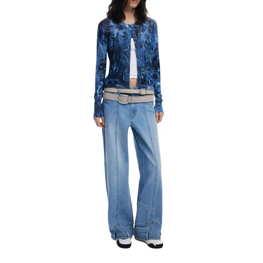 Women wearing Desigual Blue Floral Round Neck Long Cardigan with white crop top and light blue jeans