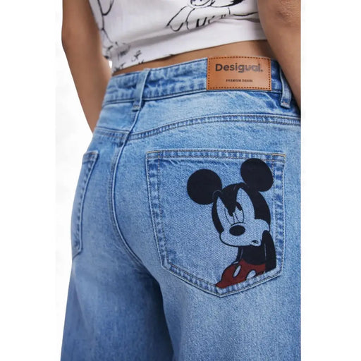 Light-wash blue denim jeans with Mickey Mouse graphic on back pocket from Desigual Women
