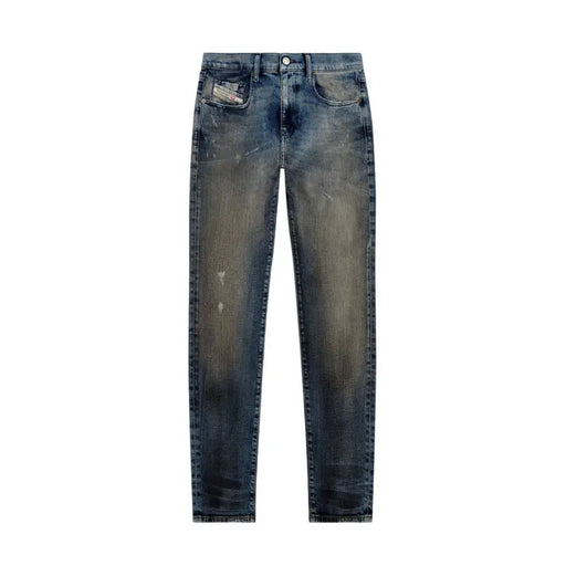 Distressed blue denim jeans with a worn look and button fly design.