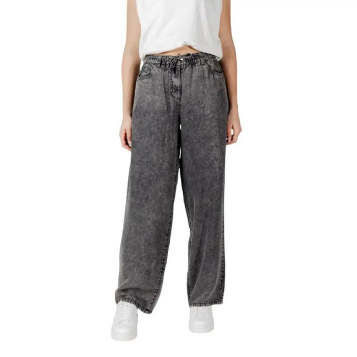 Gray acid-wash wide-leg denim pants displayed on a model for the Acid Wash Gray Denim Pants and Jeans product