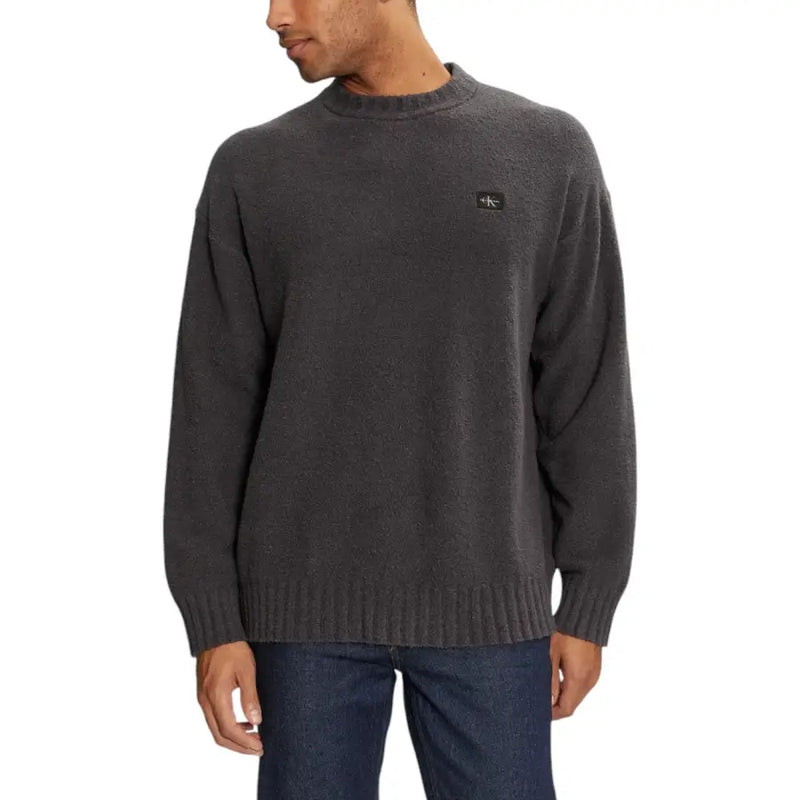 Gray knit crewneck sweater displayed in a product image, suitable for casual or formal wear