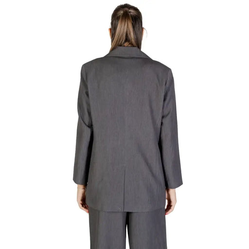 Dark gray pinstripe blazer and trousers set displayed in Grey Low Cut V Neck Women Blazer for Fall Winter