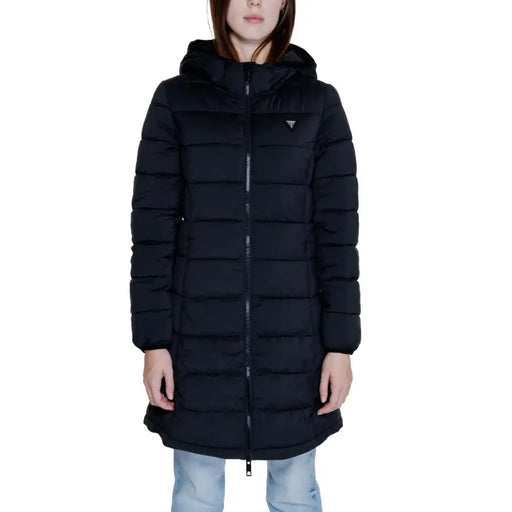 Woman wearing Guess Women Long Black Turtleneck Hooded Fall Winter Jacket with quilted design