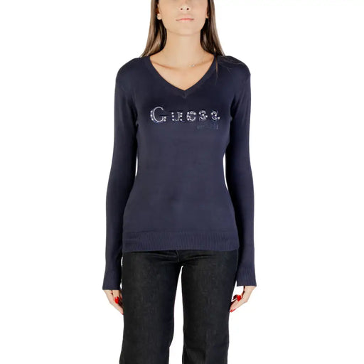 Women’s navy blue long-sleeve V-neck shirt with sparkly Guess logo for stylish women