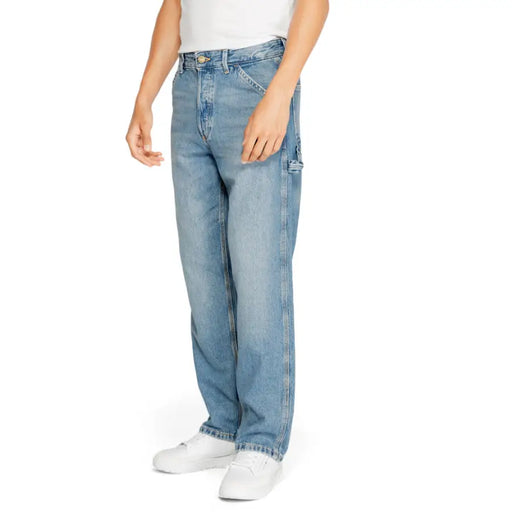 Light blue denim jeans with a classic straight leg fit and button fly design, featuring popular brand ’levi’s’ model 501.