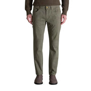 Men’s olive green cotton elastane trousers paired with a dark brown sweater and matching boots