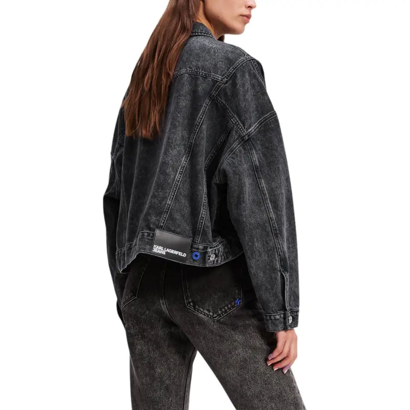Women wearing black acid-wash denim jacket and jeans from Karl Lagerfeld for fall winter