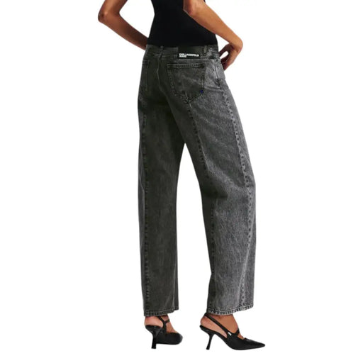 Karl Lagerfeld Women Black Cotton Jeans featuring dark grey acid-wash wide-leg style with black high heels