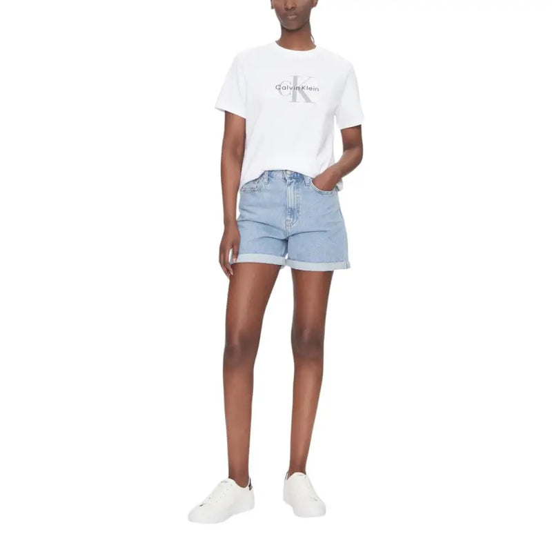 Light blue denim shorts with rolled cuffs paired with Calvin Klein Jeans White Cotton T Shirt