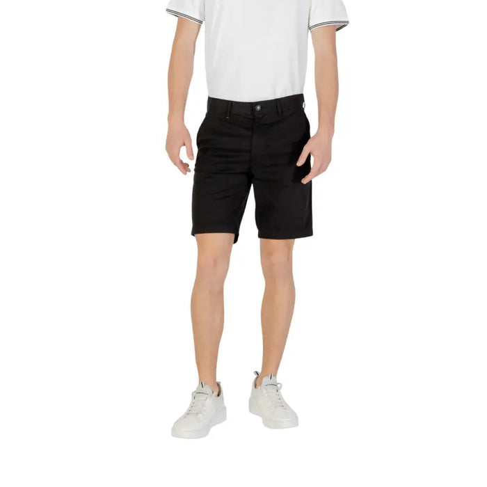 Man wearing Black Men’s Belted Shorts showcasing stylish menswear fashion