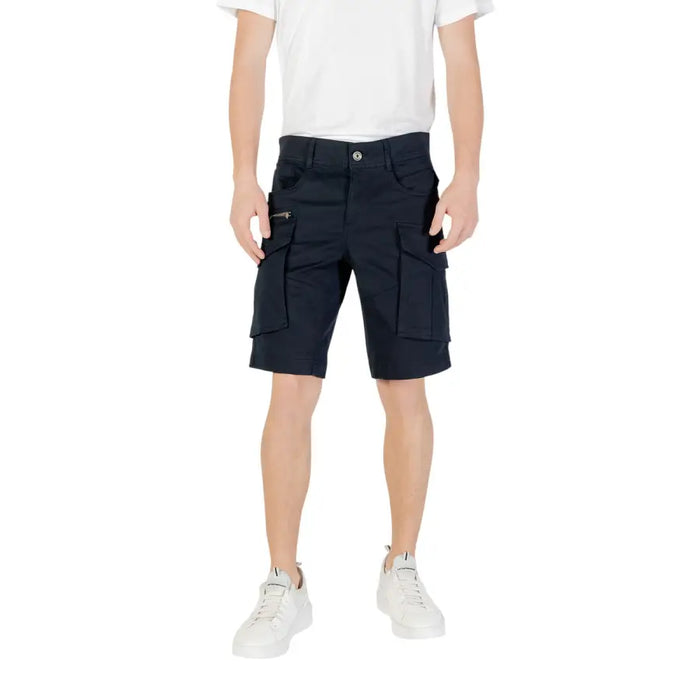 Man wearing navy blue men’s cargo shorts displayed in the product image