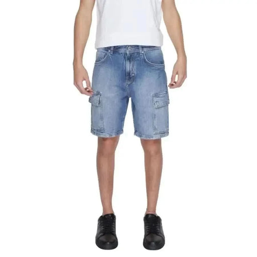 Man in white T-shirt and blue denim shorts from Antony Morato Men Shorts collection