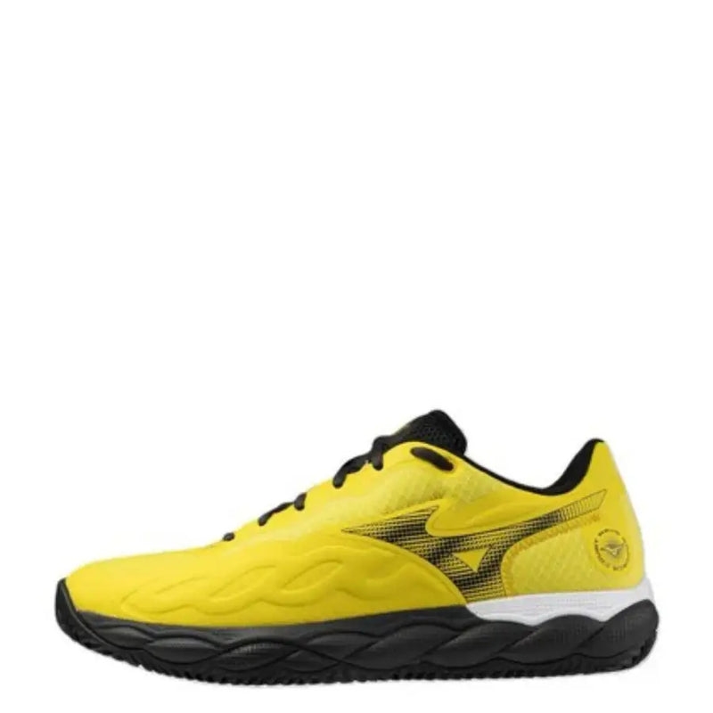 Yellow mizuno volleyball shoe with black accents and textured upper material.