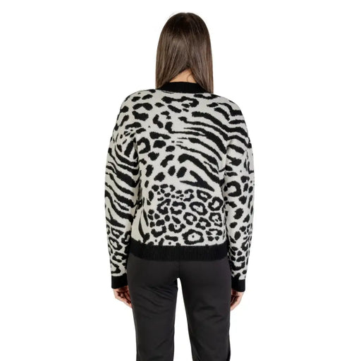 Women’s black and white animal print knit sweater from Morgan De Toi with round neckline