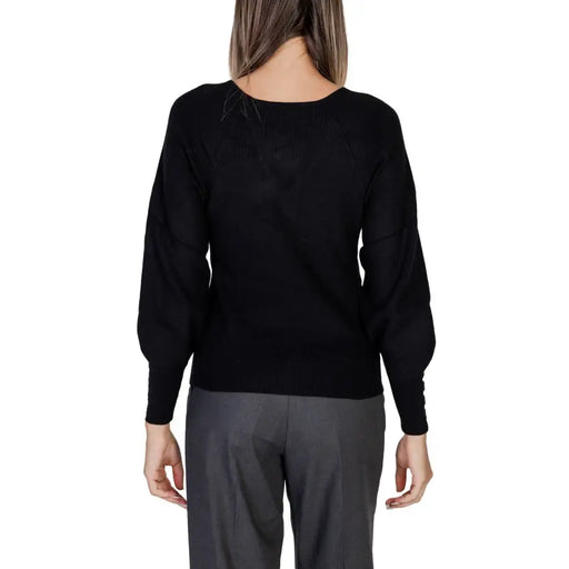 Women’s black long-sleeve knit top with puffed shoulders from Morgan De Toi