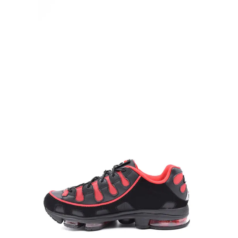 Black and red nike air max sneaker with visible air cushioning design.