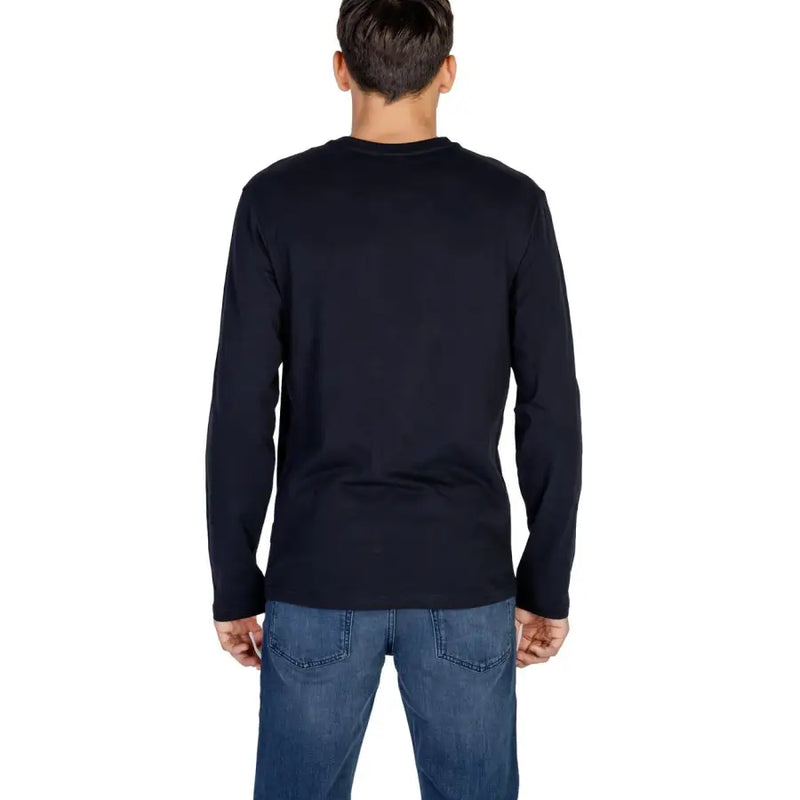 Navy blue long-sleeved crew neck sweater with ribbed cuffs and hem, likely made of cotton or polyester blend.