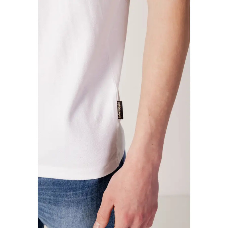 White t-shirt with gold logo and pocket detail.