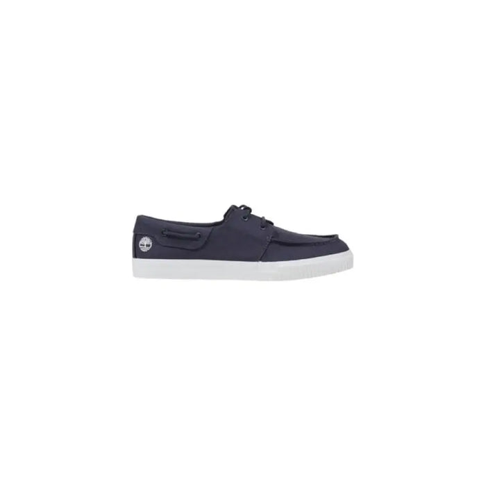 Navy blue boat shoe with white sole displayed in product named Navy Blue Boat Shoe With White Sole