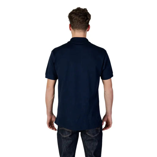 Navy blue Lacoste polo shirt displayed as a stylish men’s clothing item