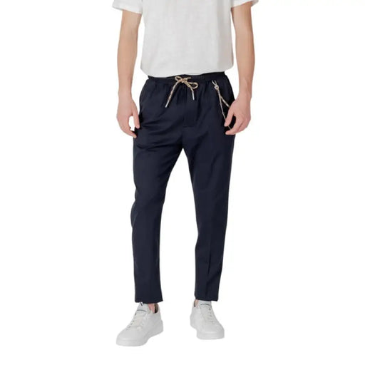 Navy blue drawstring trousers displayed in the product Navy Blue Drawstring Trousers