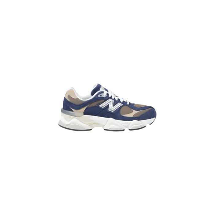 Navy and brown New Balance sneaker displayed on a white background