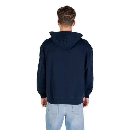 Tommy Jeans Navy Blue Hoodie displayed with hood and front pouch pocket for men
