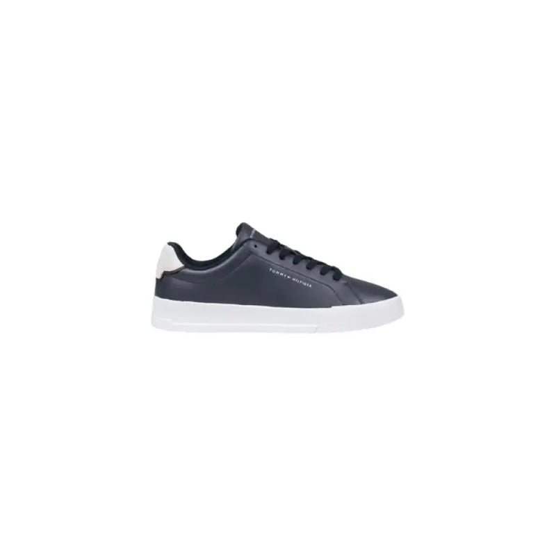 Navy and white Tommy Hilfiger leather sneaker with white sole displayed in product image