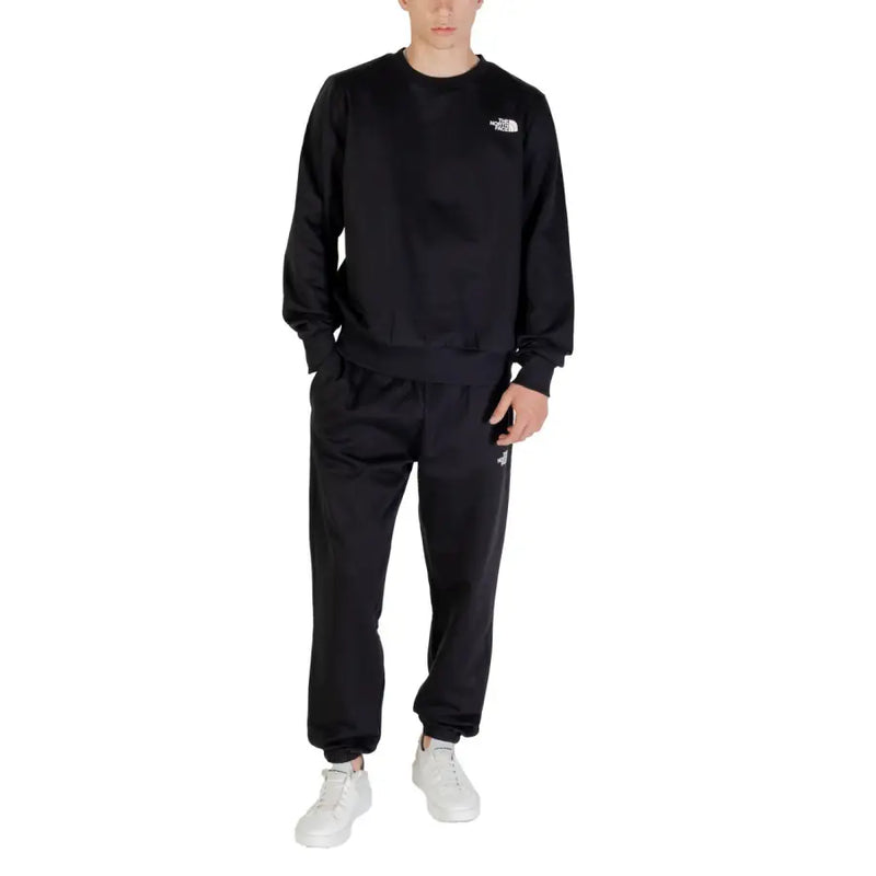Men’s black sweatshirt and sweatpants set featuring The North Face logo and printed design