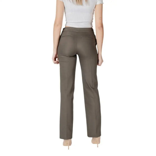 Olive green women’s dress pants showcasing a stylish and versatile design