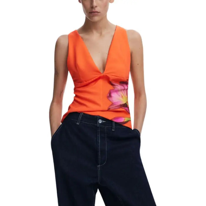 Orange floral print V-neck top displayed, stylish women’s casual wear option