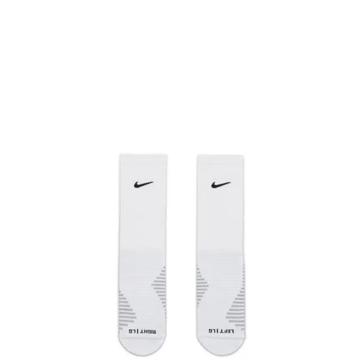 Pair of white Nike socks featuring breathable fabric, ideal for all-season comfort