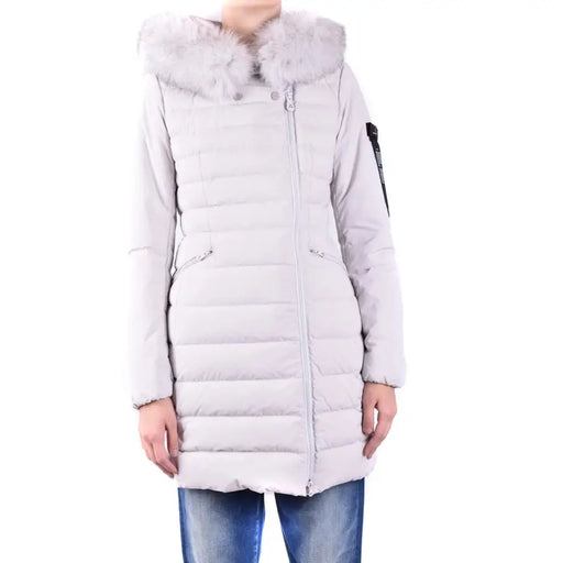 Light gray quilted puffer coat with fur-trimmed hood and asymmetrical zipper for women