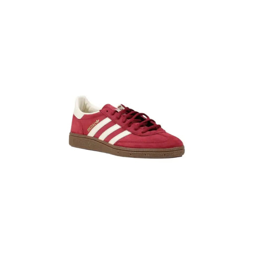 Red Adidas Spezial sneaker in red and white colorway displayed for sale