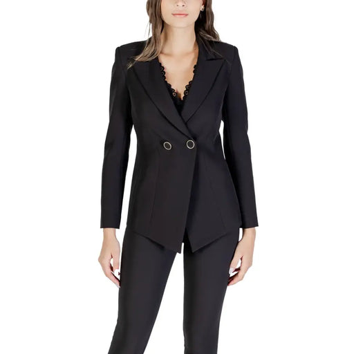 Woman wearing Rinascimento Women Black Blazer with V-neck and lapel detail