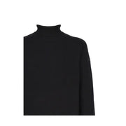 Black high-neck sweater with ribbed edge, likely made of wool or cotton blend.