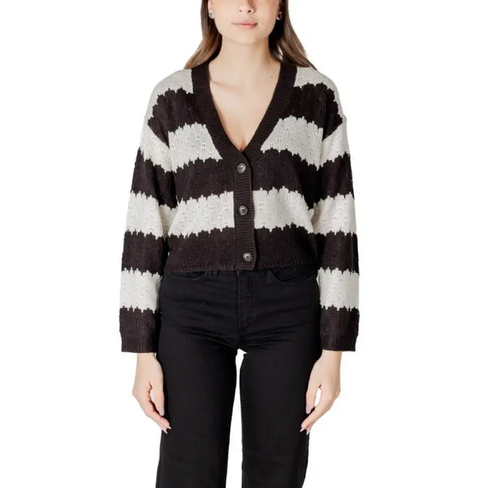 Striped knit cardigan displayed in the product named Striped Knit Cardigan
