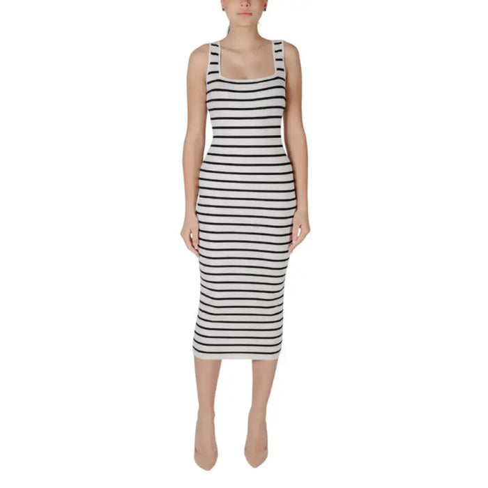Striped sleeveless midi dress displayed on a model showcasing stylish summer apparel