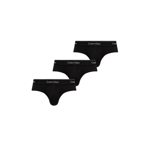 Three black Calvin Klein thongs from the Calvin Klein Thong and Brief Collection