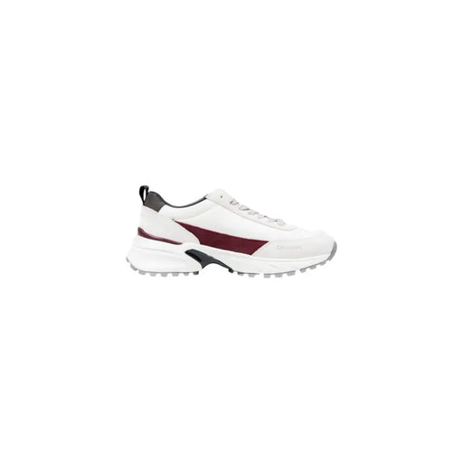 White and burgundy Calvin Klein slip-on sneakers with grey soles and black accents