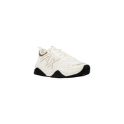 White and gold Armani Exchange women’s athletic sneaker with black rubber sole