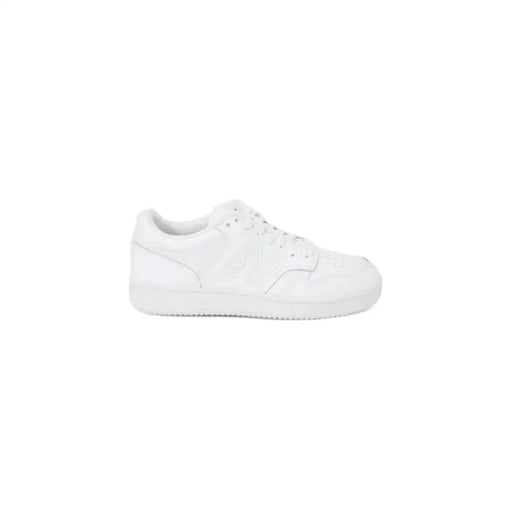 New Balance Women’s White Sneakers Size 3 featuring a sleek white leather design