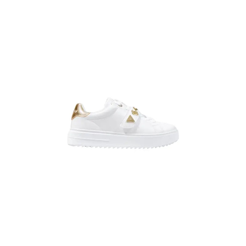 White platform sneakers with gold accents and decorative gold triangles on laces