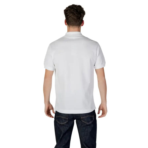 White polo shirt from Lacoste’s collection, short sleeve design for a classic look