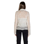 White sheer long-sleeve lace top over camisole in Guess Classic Beige Buttoned Long Sleeve Shirt