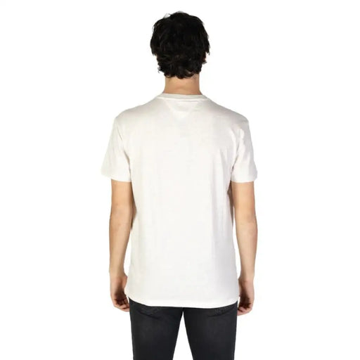 Men’s white short-sleeved Tommy Jeans T-shirt displayed for casual wear