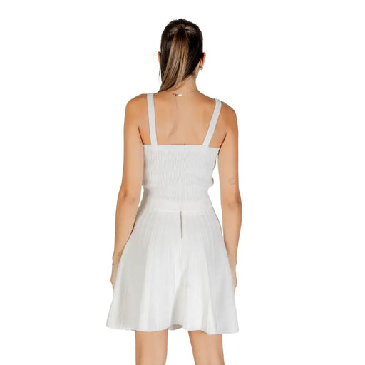 White sleeveless top and skirt set featured in Guess White Strappy Round Neck Top product image