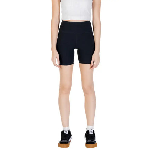 Woman wearing Womens Black Biker Athletic Shorts for activewear and casual style