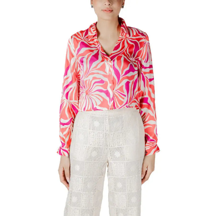 Woman wearing a patterned blouse and lace pants from Patterned Blouse and Lace Pants for Women collection