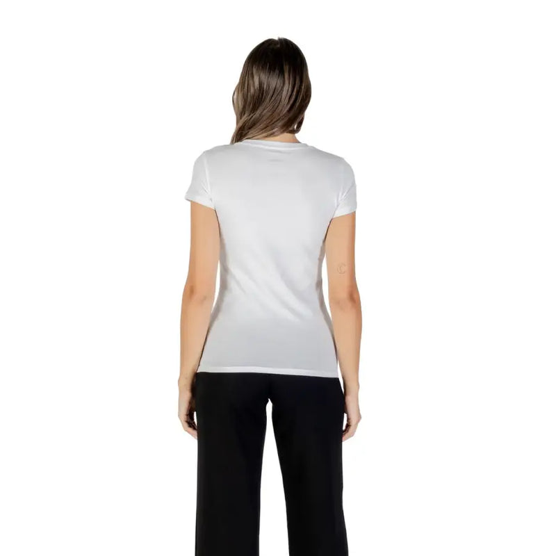 Woman wearing Armani Exchange white rhinestone print short sleeve T shirt